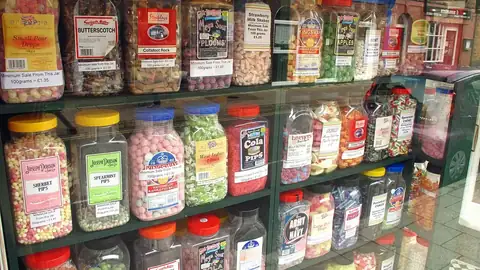 Shelves of lolly jars